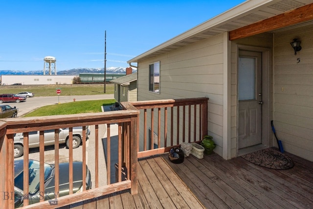 500/502 Idaho St, Belgrade, MT 59714 - wooden deck featuring a mountain view and covered porch