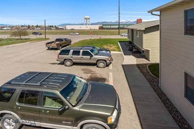 500/502 Idaho St, Belgrade, MT 59714 - uncovered parking lot with a mountain view
