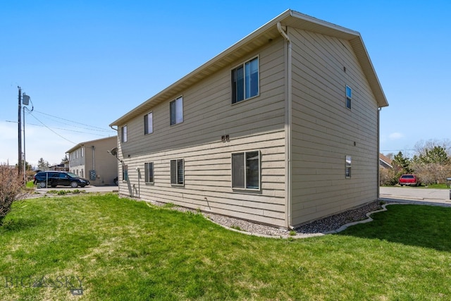 500/502 Idaho St, Belgrade, MT 59714 - rear view of property with a yard