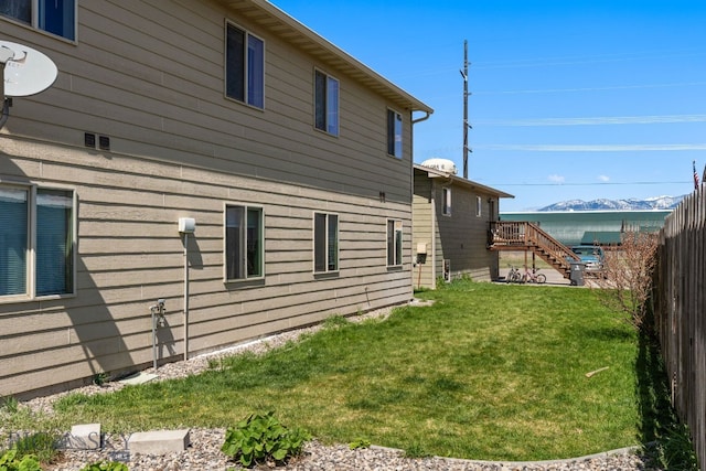 500/502 Idaho St, Belgrade, MT 59714 - view of property exterior featuring a mountain view and stairs