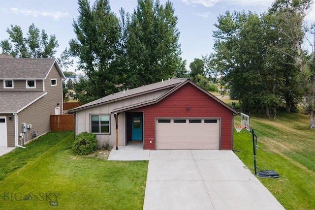 13 Ramshorn Peak Ln, Bozeman, MT 59718 - view of front of property featuring board and batten siding, concrete driveway, and a garage