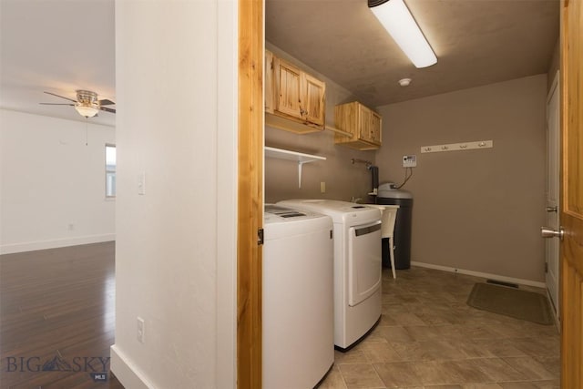 laundry room featuring cabinet space, washer and clothes dryer, ceiling fan, and baseboards