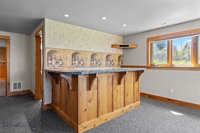 3450 W Hollyhock Dr, Belgrade, MT 59714 - indoor dry bar featuring dark carpet, baseboards, and recessed lighting