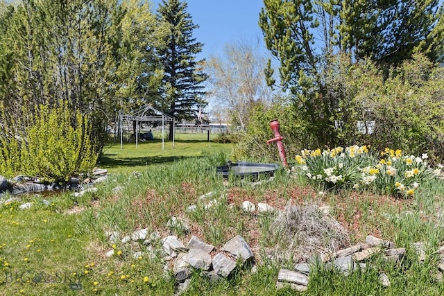 3450 W Hollyhock Dr, Belgrade, MT 59714 - view of grassy yard with a gazebo