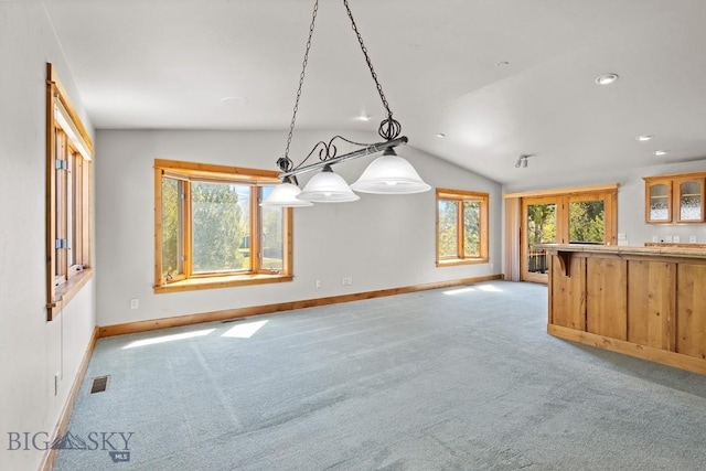 3450 W Hollyhock Dr, Belgrade, MT 59714 - empty room with lofted ceiling, baseboards, light colored carpet, and recessed lighting