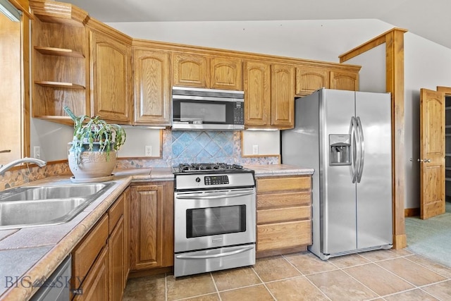 3450 W Hollyhock Dr, Belgrade, MT 59714 - kitchen featuring appliances with stainless steel finishes, open shelves, a sink, and light countertops