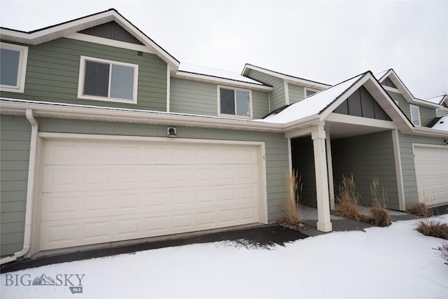 view of front of home with board and batten siding and an attached garage