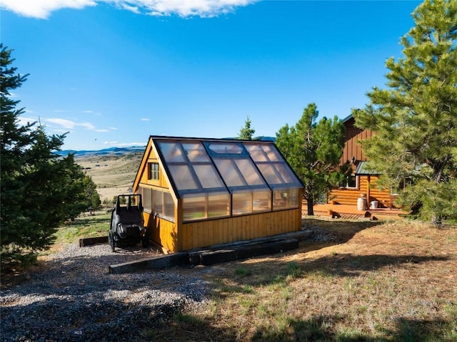 101 Deerfoot Trl, Ennis, MT 59729 - view of greenhouse featuring a mountain view