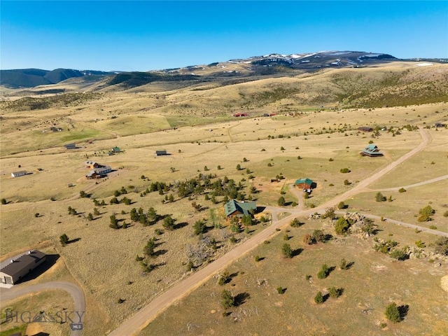 101 Deerfoot Trl, Ennis, MT 59729 - aerial view of property's location featuring rural landscape and a mountain backdrop