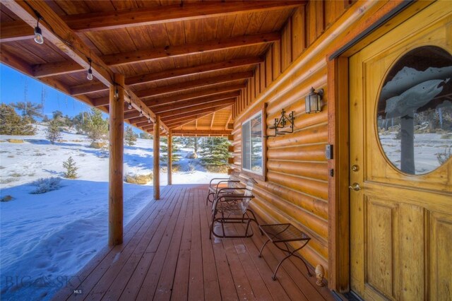 101 Deerfoot Trl, Ennis, MT 59729 - view of snow covered deck