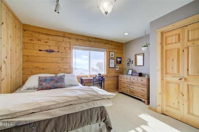101 Deerfoot Trl, Ennis, MT 59729 - bedroom with wood walls, carpet flooring, and recessed lighting