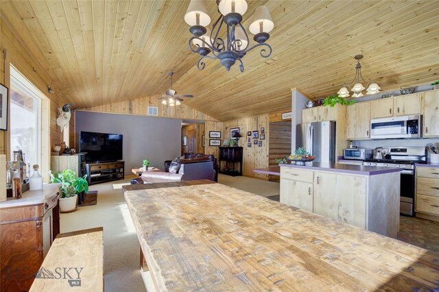 101 Deerfoot Trl, Ennis, MT 59729 - kitchen featuring stainless steel appliances, a chandelier, lofted ceiling, a kitchen island, and wood ceiling