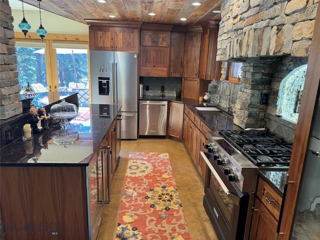 31 Basin Creek Rd, Boulder, MT 59631 - kitchen with stainless steel appliances, a sink, recessed lighting, tasteful backsplash, and french doors