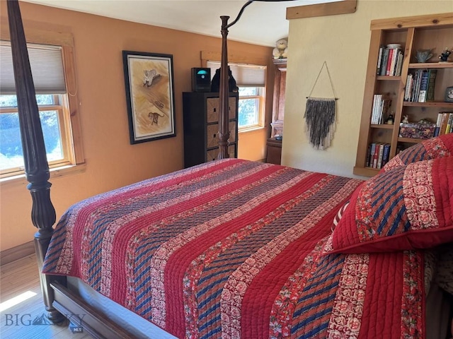 31 Basin Creek Rd, Boulder, MT 59631 - bedroom with wood finished floors