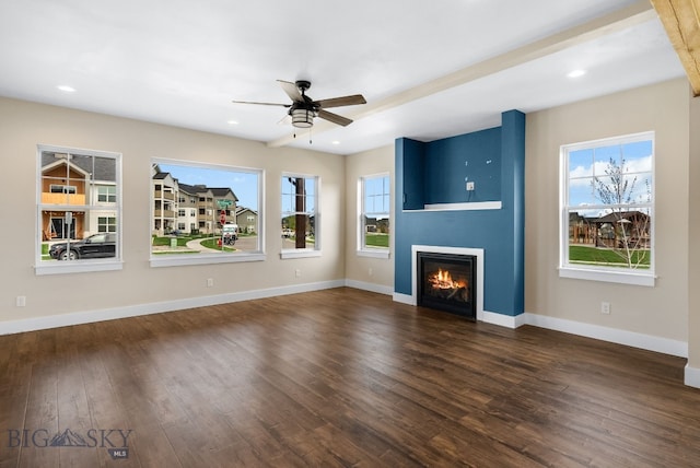 1650 Windrow, Bozeman, MT 59718 - unfurnished living room with dark wood-style flooring, a fireplace, a ceiling fan, baseboards, and recessed lighting