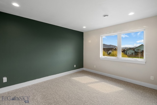 1650 Windrow, Bozeman, MT 59718 - empty room featuring recessed lighting, light carpet, and baseboards