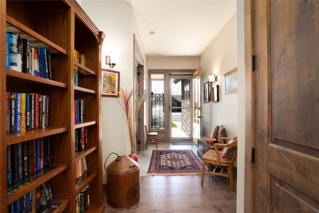 hall featuring wood finished floors