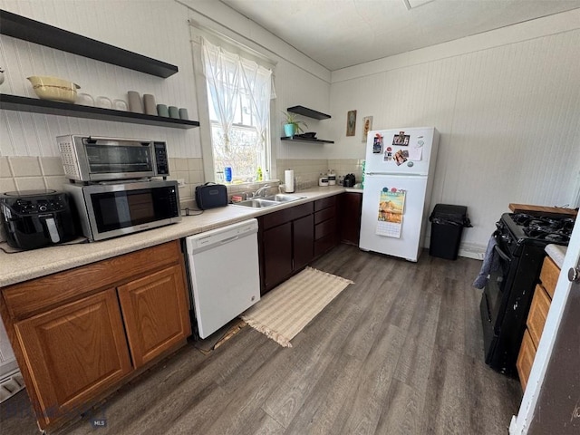 1100 Caledonia St, Butte, MT 59701 - kitchen featuring open shelves, white appliances, a sink, dark wood-type flooring, and decorative backsplash