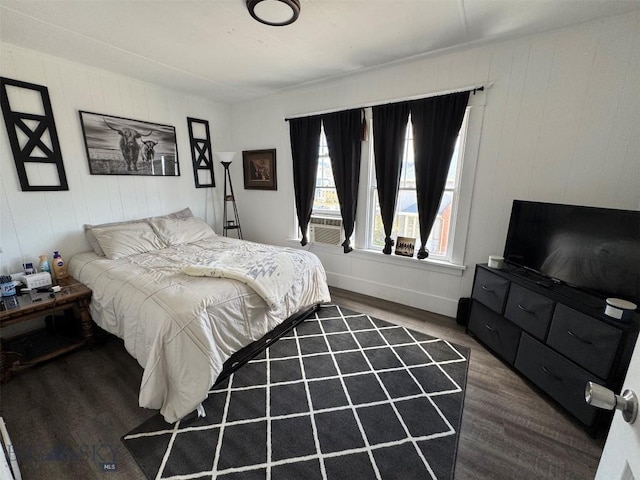 1100 Caledonia St, Butte, MT 59701 - bedroom featuring wood finished floors and cooling unit
