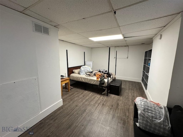 1100 Caledonia St, Butte, MT 59701 - bedroom with a drop ceiling, wood finished floors, and baseboards