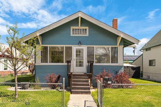 bungalow-style home featuring a chimney
