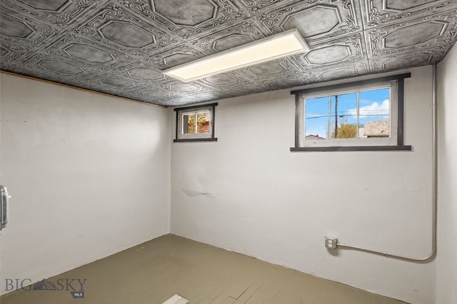 basement with an ornate ceiling