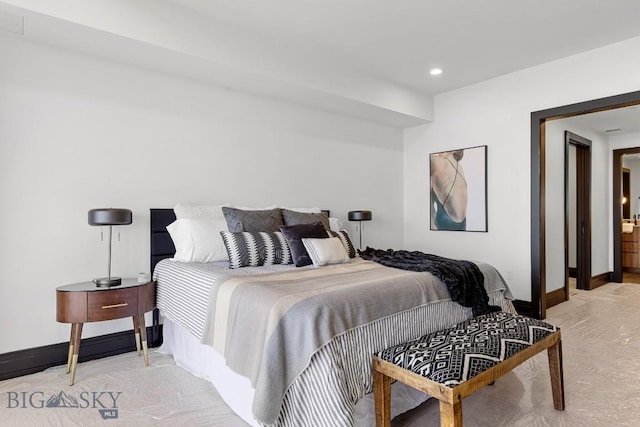 bedroom featuring baseboards and recessed lighting