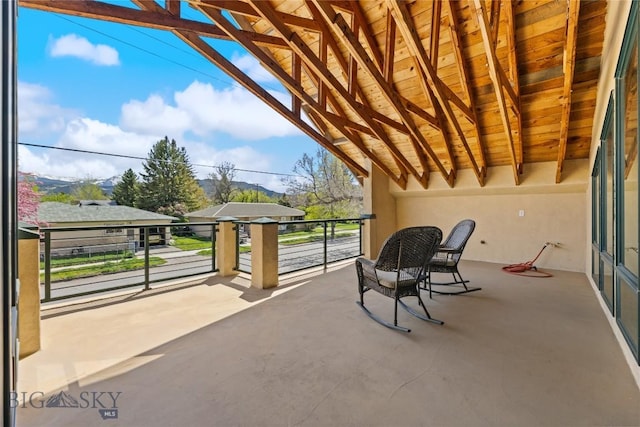 view of patio with a balcony