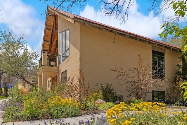 view of home's exterior with stucco siding
