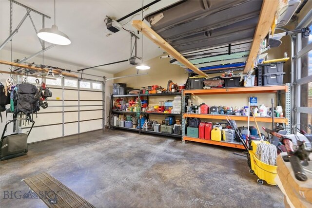 garage featuring a garage door opener