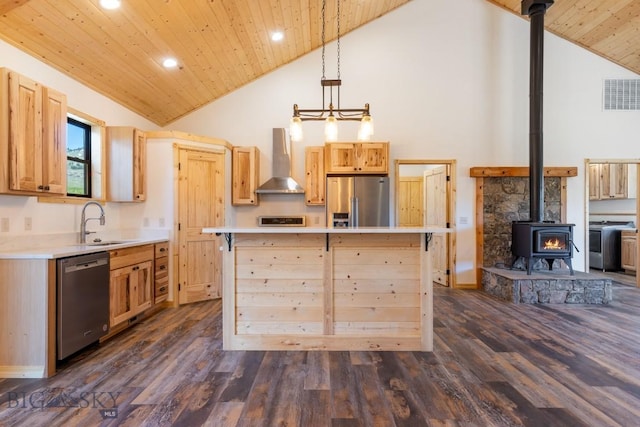 kitchen featuring appliances with stainless steel finishes, wall chimney exhaust hood, a wood stove, wooden ceiling, and high vaulted ceiling