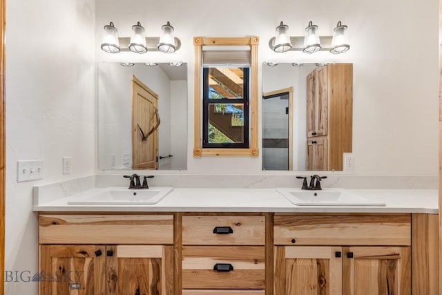 bathroom featuring double vanity