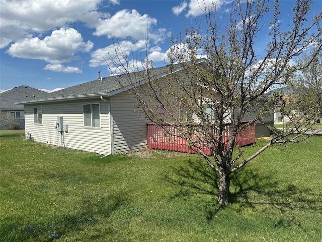 2921 Mammoth, Butte, MT 59701 - view of property exterior with a deck, a lawn, and roof with shingles