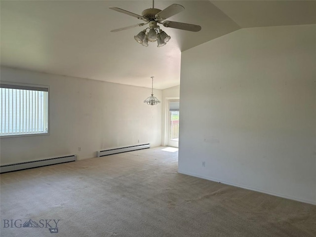 2921 Mammoth, Butte, MT 59701 - carpeted spare room with a baseboard radiator, vaulted ceiling, ceiling fan, and a chandelier