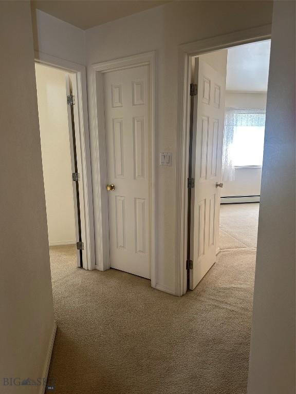 2921 Mammoth, Butte, MT 59701 - hall featuring carpet floors, baseboard heating, and baseboards