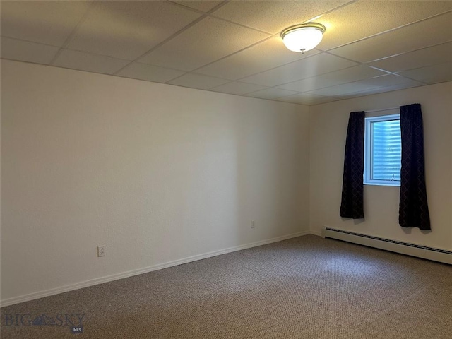 2921 Mammoth, Butte, MT 59701 - carpeted empty room featuring a drop ceiling, a baseboard radiator, and baseboards