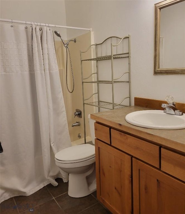full bath featuring tile patterned floors, toilet, shower / tub combo with curtain, and vanity
