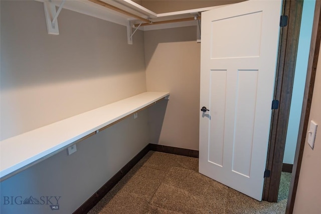 spacious closet with built in study area
