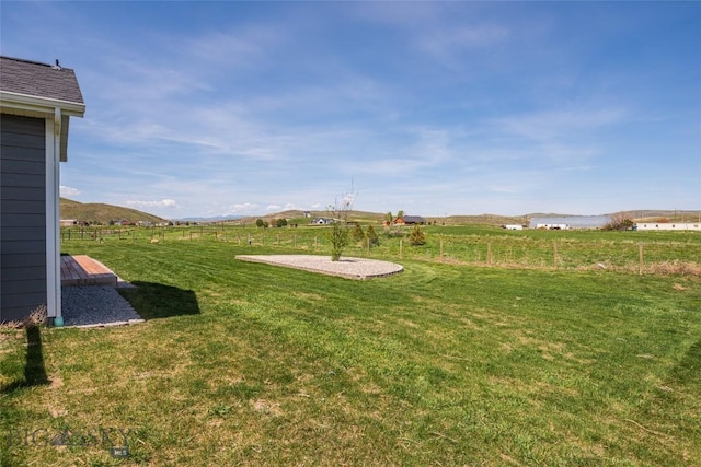 view of yard featuring a view of countryside