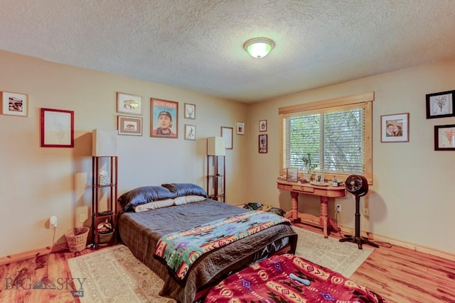 1816 S Rouse Unit 1 & 2, Bozeman, MT 59715 - bedroom with a textured ceiling, wood finished floors, and baseboards