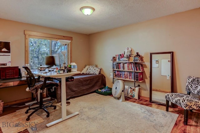 1816 S Rouse, Bozeman, MT 59715 - office area with a textured ceiling and wood finished floors