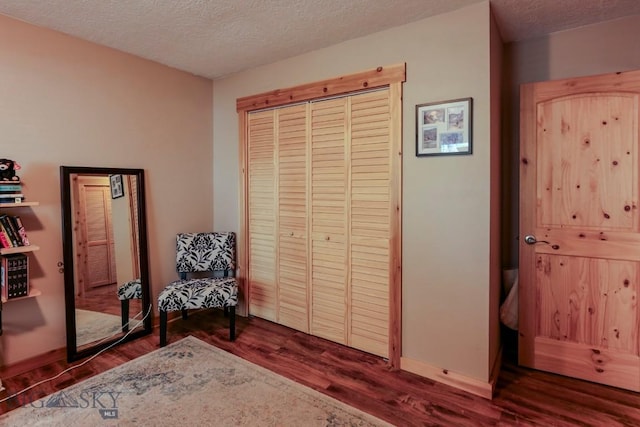 1816 S Rouse, Bozeman, MT 59715 - living area with dark wood-type flooring and a textured ceiling