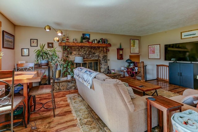 1816 S Rouse, Bozeman, MT 59715 - living area featuring wood finished floors and a textured ceiling