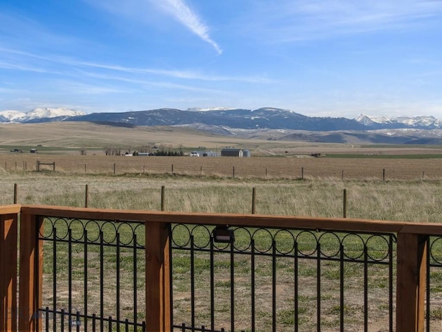 view of mountain background featuring rural landscape