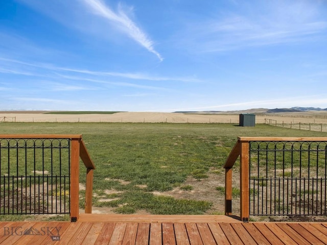wooden deck featuring a view of countryside