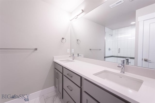 440 Meriwether Ave, Bozeman, MT 59718 - full bath with baseboards, marble finish floors, a stall shower, and double vanity
