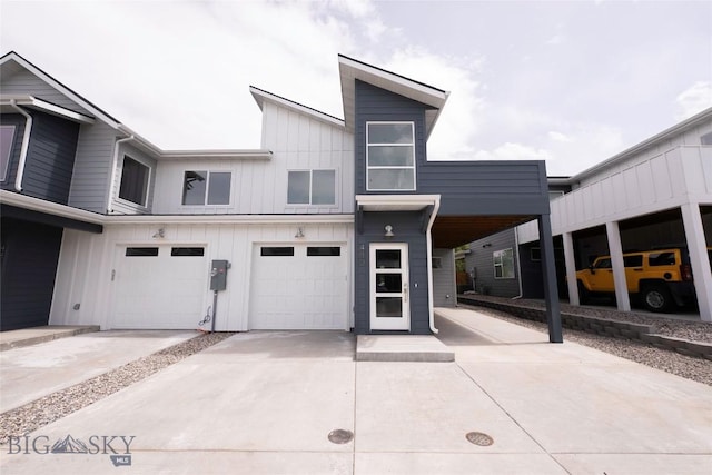 440 Meriwether Ave, Bozeman, MT 59718 - view of front of property with concrete driveway, board and batten siding, and an attached garage