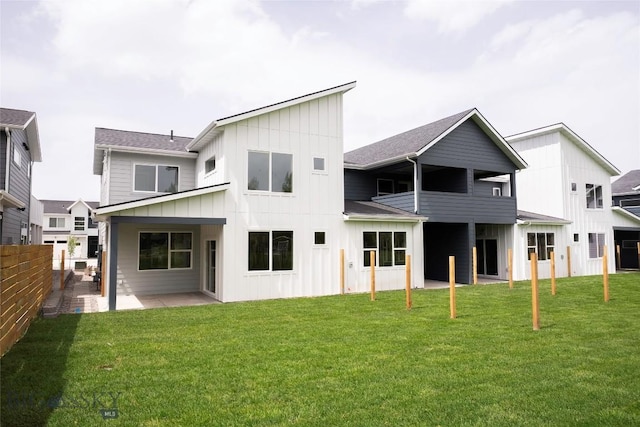 440 Meriwether Ave, Bozeman, MT 59718 - back of house with board and batten siding and a patio