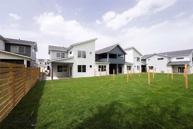 440 Meriwether Ave, Bozeman, MT 59718 - back of house featuring board and batten siding and a patio area