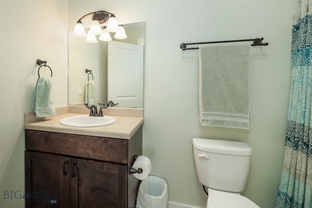 342 Parklands Trl, Bozeman, MT 59718 - full bathroom with toilet, vanity, and a shower with shower curtain